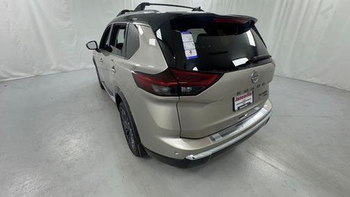 Champagne Silver Metallic/Super Black 2026 Nissan Rogue Platinum