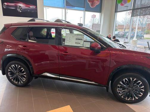 Scarlet Ember Tintcoat 2026 Nissan Rogue Platinum