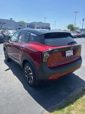 Scarlet Ember Tintcoat/Super Black 2025 Nissan Kicks SR