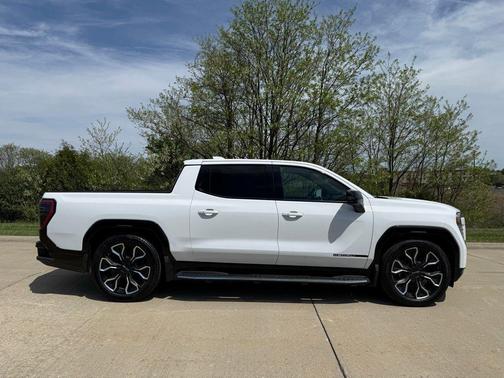 Summit White 2025 GMC Sierra EV Max Range Denali