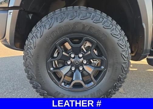 Diamond Black Crystal Pearlcoat 2025 RAM 1500 RHO Crew Cab 4x4 5'7' Box
