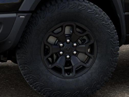 Diamond Black Crystal Pearlcoat 2026 RAM 1500 RHO Crew Cab 4x4 5'7' Box