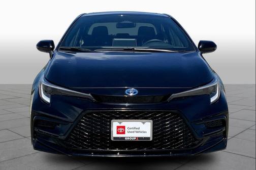 Midnight Black Metallic 2025 Toyota Corolla Hybrid SE