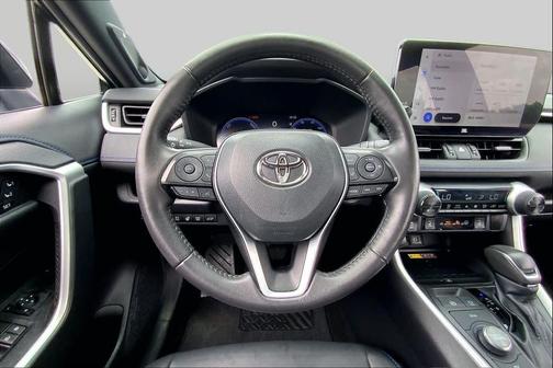 Wind Chill Pearl/Midnight Black Metallic 2023 Toyota RAV4 Hybrid SE