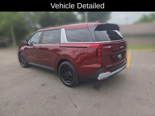 Red 2026 Kia Carnival LXS