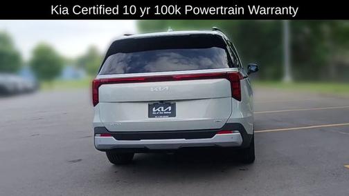 Ivory 2025 Kia Carnival Hybrid EX