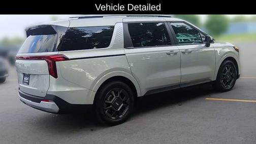 Ivory 2025 Kia Carnival Hybrid EX