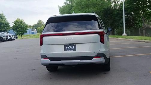 Ivory 2025 Kia Carnival Hybrid EX