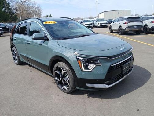 Cityscape Green 2023 Kia Niro SX Touring
