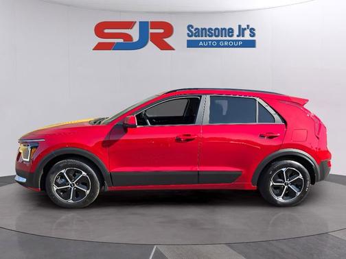 Red 2025 Kia Niro LX