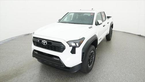 White 2025 Toyota Tacoma Hybrid