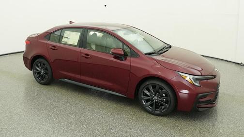 Red 2026 Toyota Corolla Hybrid SE