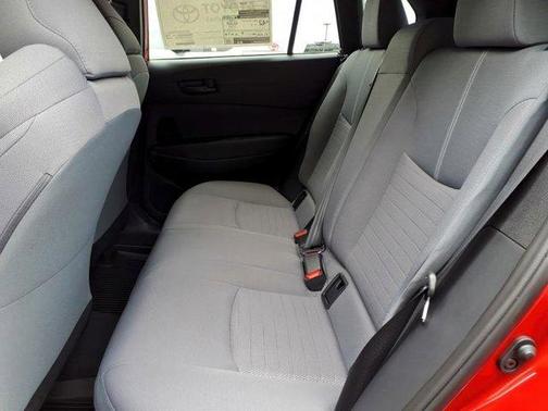 Red 2026 Toyota Corolla Cross Hybrid SE