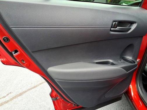 Red 2026 Toyota Corolla Cross Hybrid SE