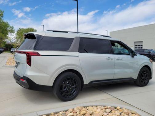 Ivory Silver 2025 Kia Carnival Hybrid SX Prestige