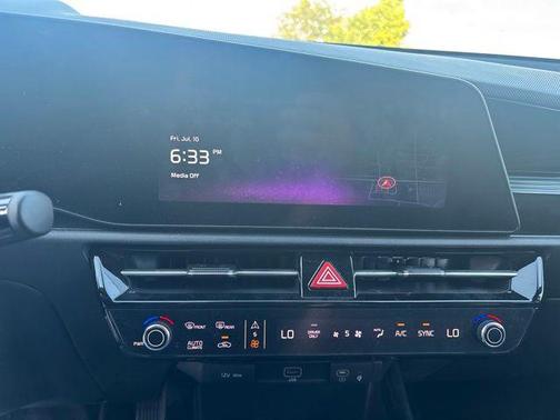 Cityscape Green 2024 Kia Niro Plug-In Hybrid EX