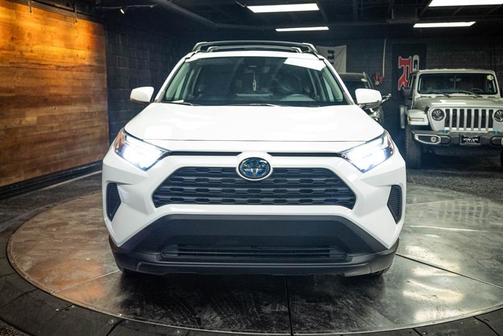 White 2023 Toyota RAV4 Hybrid XLE