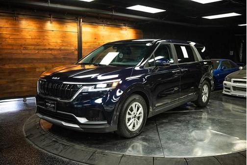 Blue 2024 Kia Carnival LX
