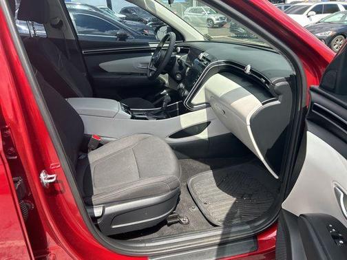 Red 2024 Hyundai TUCSON SE