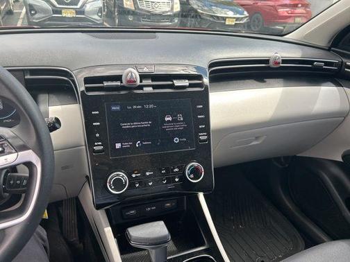 Red 2024 Hyundai TUCSON SE