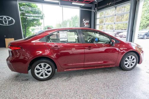 Ruby Flare Pearl 2025 Toyota Corolla Hybrid SE