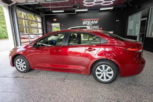 Ruby Flare Pearl 2025 Toyota Corolla Hybrid SE