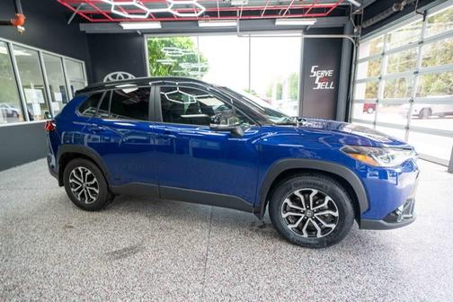 Blue Crush Metallic/Jet Black 2024 Toyota Corolla Hybrid SE