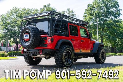 Red 2024 Jeep Wrangler Sport S