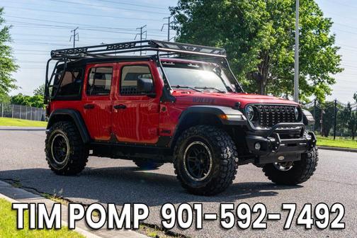 Red 2024 Jeep Wrangler Sport S