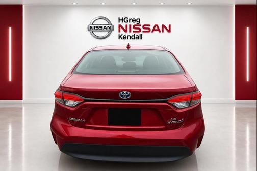 Ruby Flare Pearl 2024 Toyota Corolla Hybrid SE