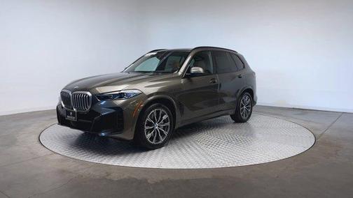 Manhattan Green Metallic 2024 BMW X5 PHEV xDrive50e