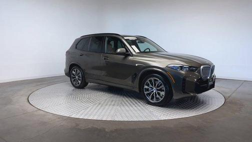 Manhattan Green Metallic 2024 BMW X5 PHEV xDrive50e