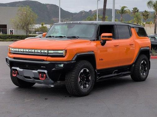 Orange 2024 GMC HUMMER EV SUV 3X