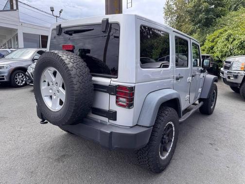 Bright Silver Metallic Clearcoat 2011 Jeep Wrangler Unlimited Sport