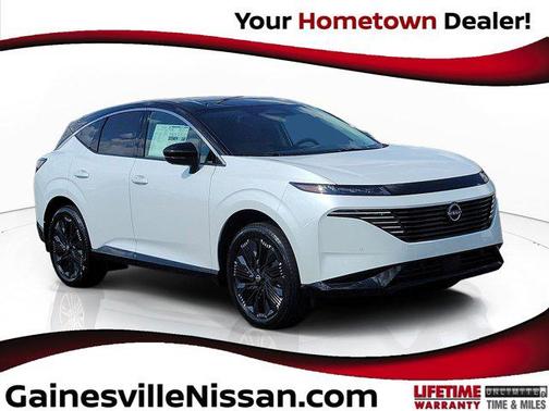Everest White Pearl Tricoat/Super Black 2026 Nissan Murano Platinum