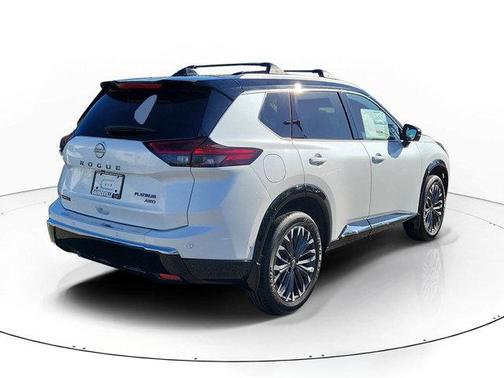 Everest White Pearl/Super Black 2026 Nissan Rogue Platinum