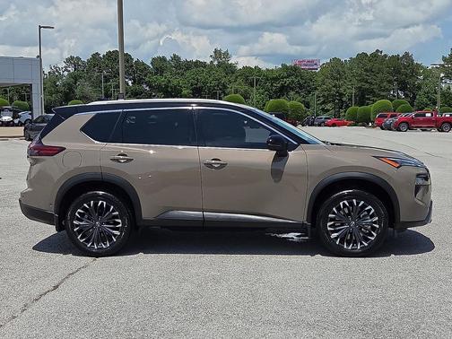 Baja Storm Metallic/Super Black 2025 Nissan Rogue SL