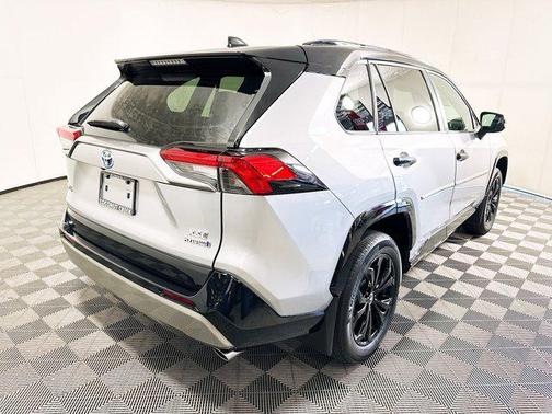 Midnight Black Metallic 2024 Toyota RAV4 Hybrid SE
