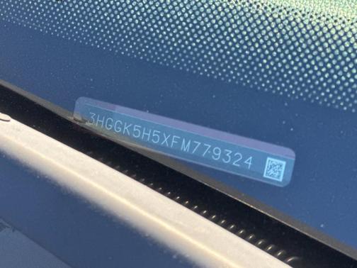 Red 2015 Honda Fit LX