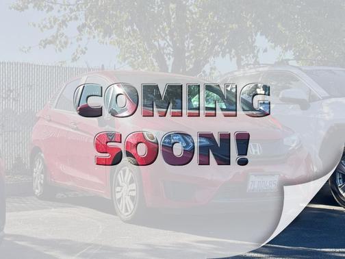 Red 2015 Honda Fit LX