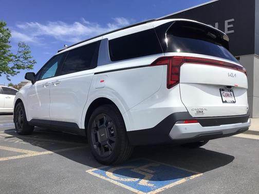 Snow White Pearl 2026 Kia Carnival Hybrid EX