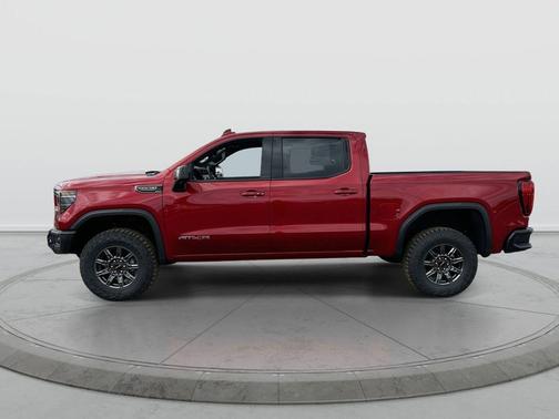 Volcanic Red 2026 GMC Sierra 1500 AT4X