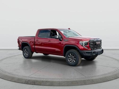 Volcanic Red 2026 GMC Sierra 1500 AT4X
