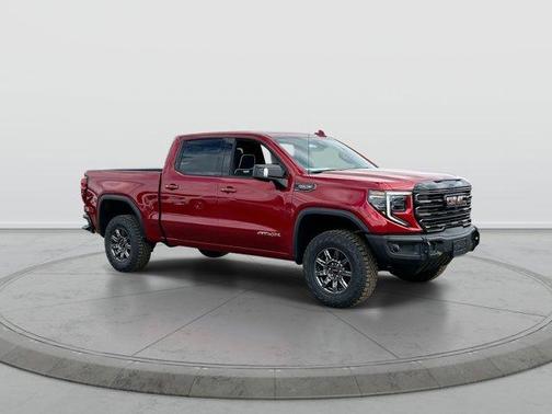 Volcanic Red 2026 GMC Sierra 1500 AT4X