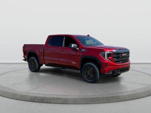 Volcanic Red 2024 GMC Sierra 1500 AT4