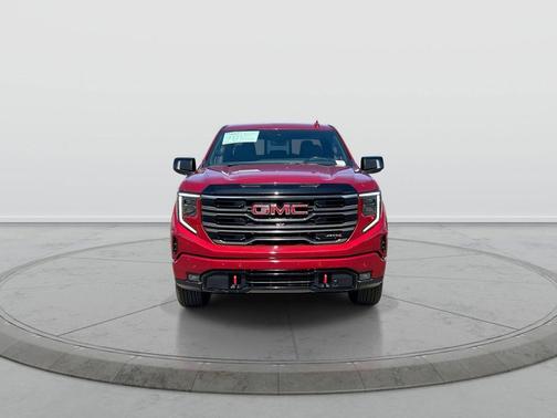 Volcanic Red 2025 GMC Sierra 1500 AT4