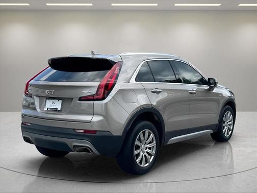 Latte Metallic 2023 Cadillac XT4 Premium Luxury