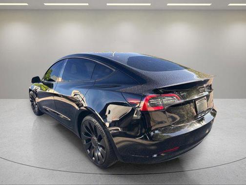 Solid Black 2023 Tesla Model 3 Performance