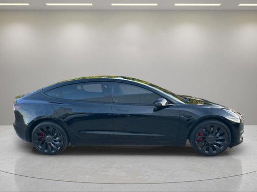 Solid Black 2023 Tesla Model 3 Performance