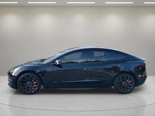 Solid Black 2023 Tesla Model 3 Performance